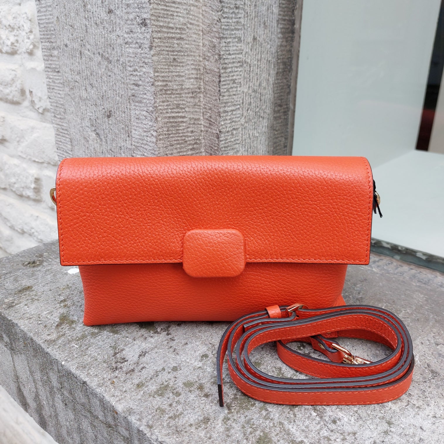 Handtasje leder oranje