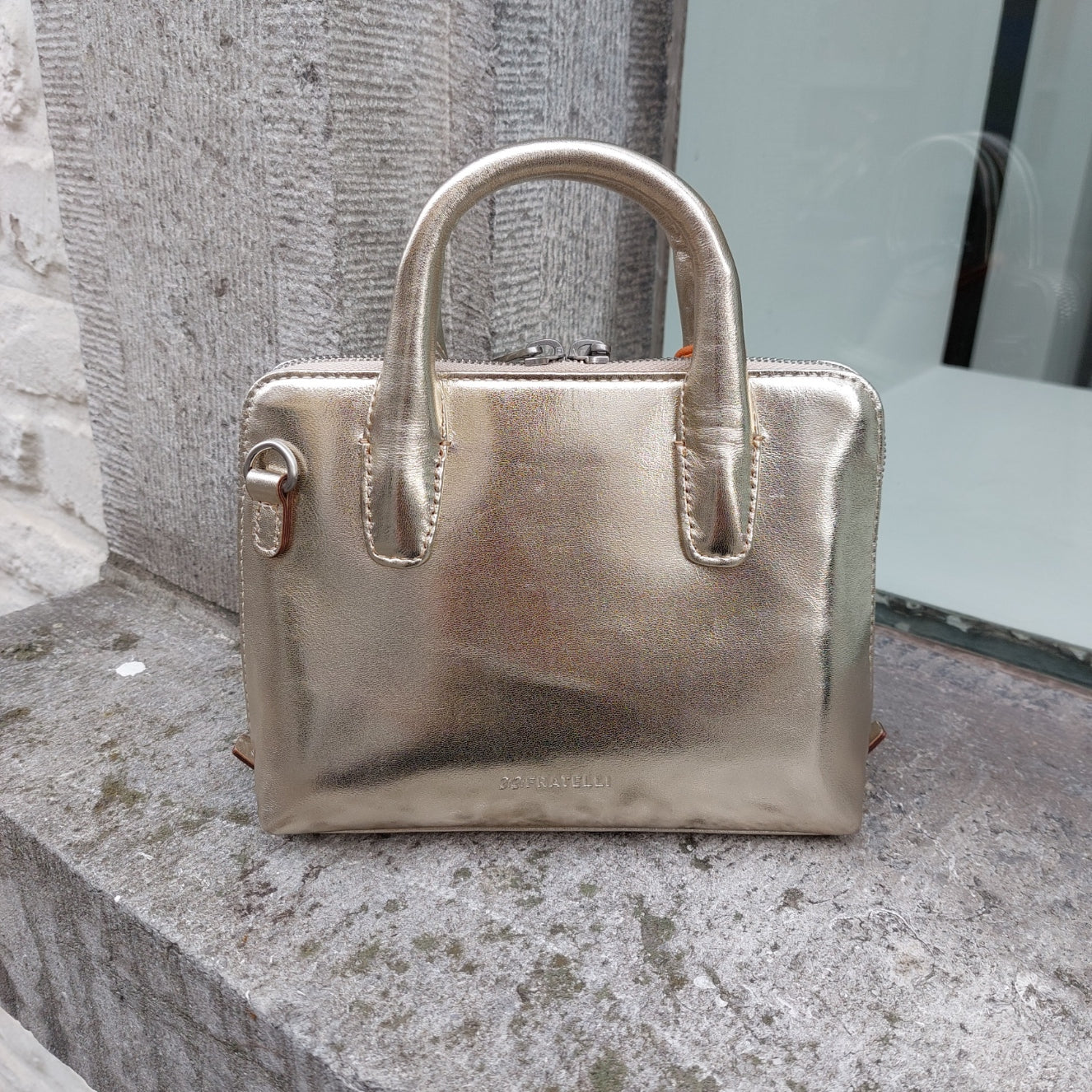 Handtasje leder