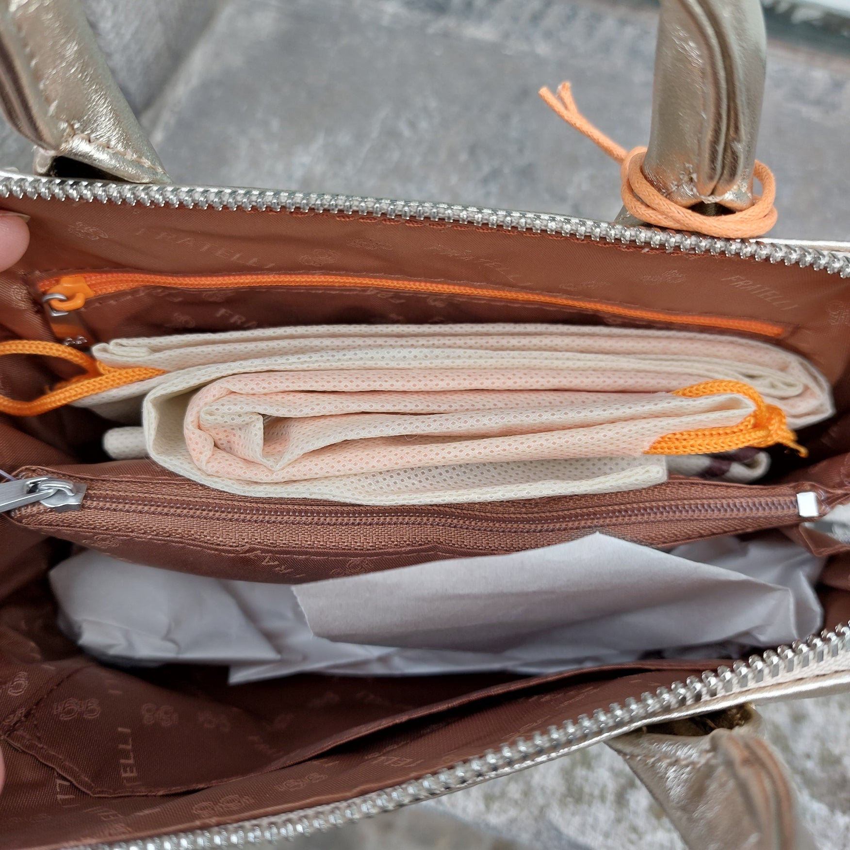 Handtasje leder