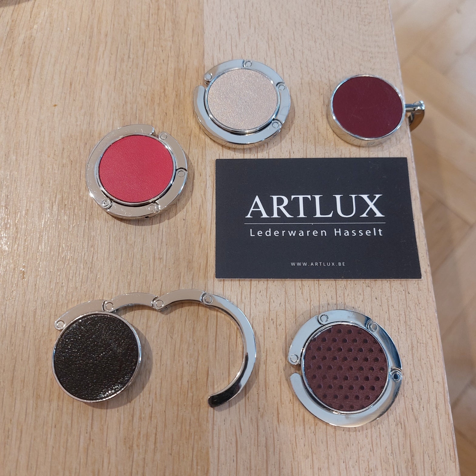 Handtasdrager/houder leder GRATIS