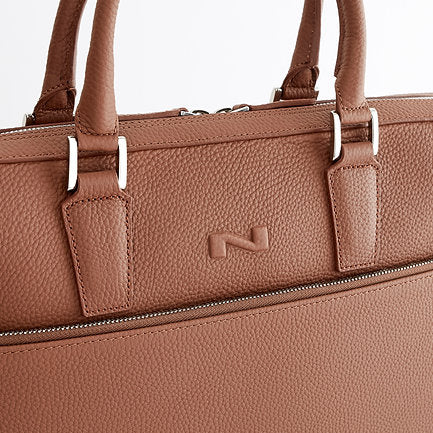 Tas leder Nathan