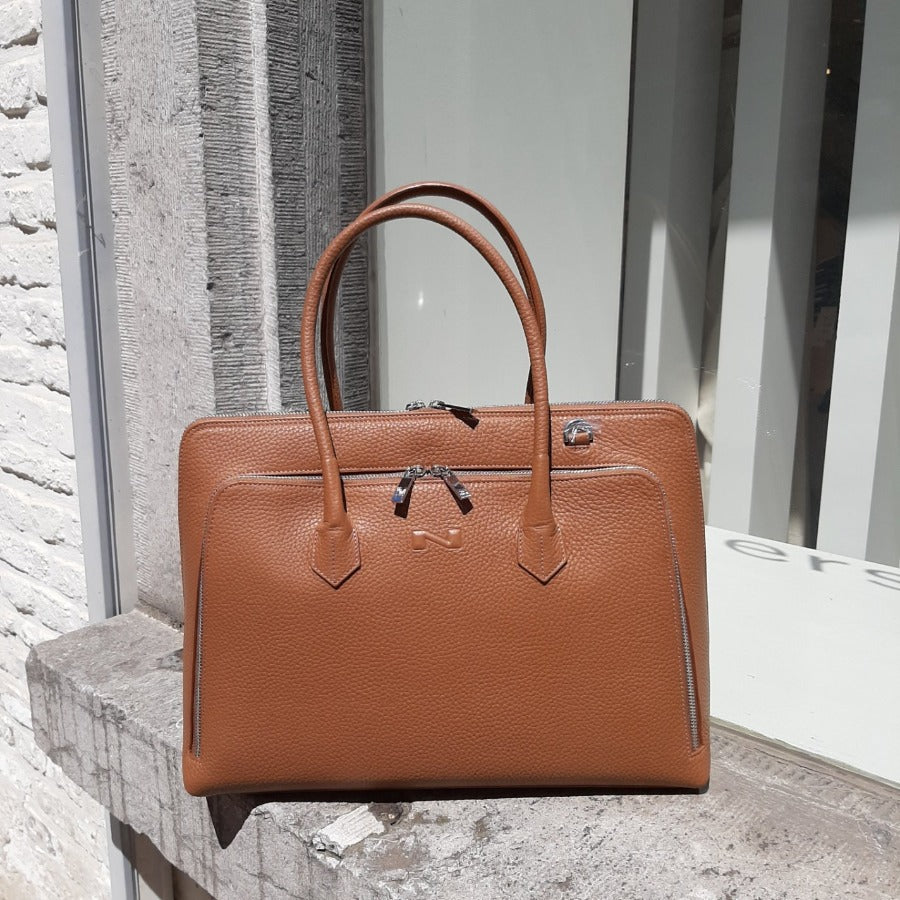 Tas leder Nathan-Baume